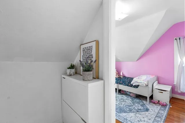 a bathroom with a sink toilet and mirror
