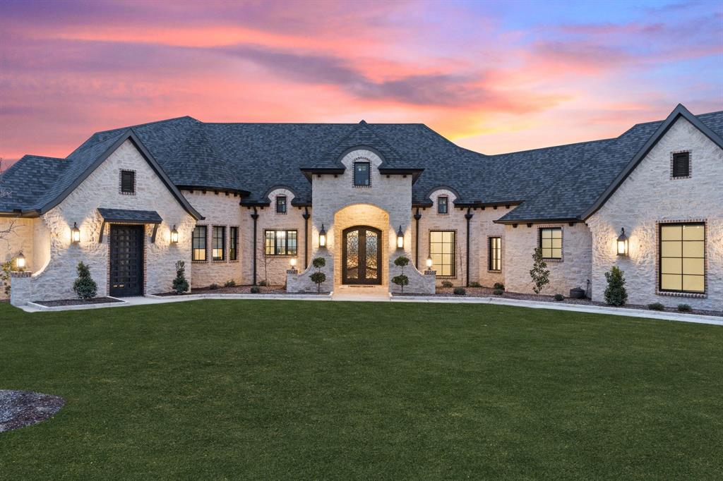 144 Condor View Weatherford, TX 76087 - Photo 1 of 1 a front view of a house with a garden