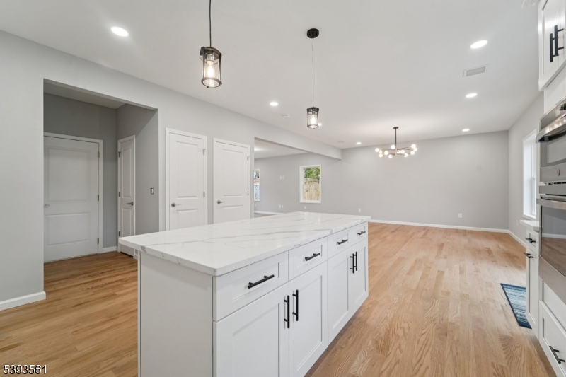 120 Addison Street Boonton, NJ 07005 - Photo 11 of 44 a bathroom with a sink a vanity and a large mirror