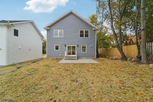 a front view of a house with garage