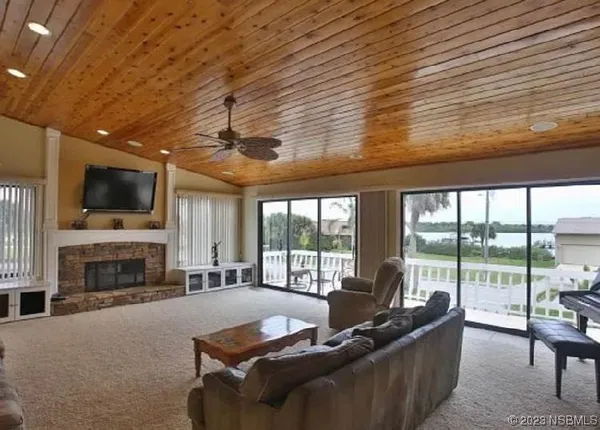 a view of a room with a balcony
