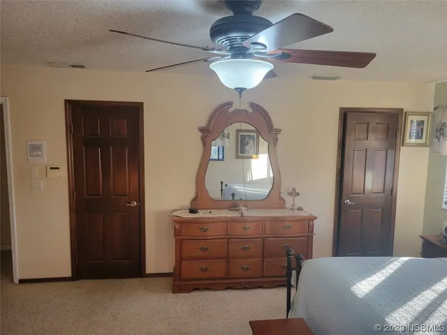 a bathroom with mirror sink and vanity