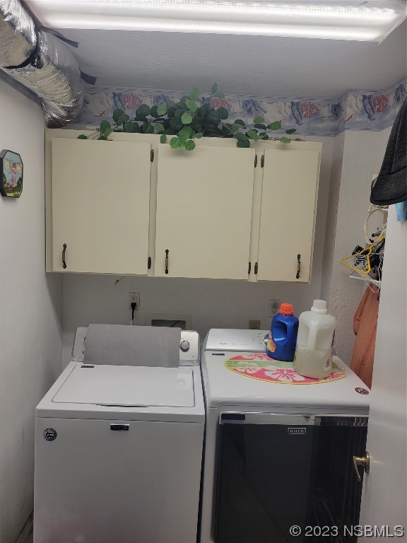 1012 South Riverside Drive Edgewater, FL 32132 - Photo 31 of 31 a utility room with dryer and washer