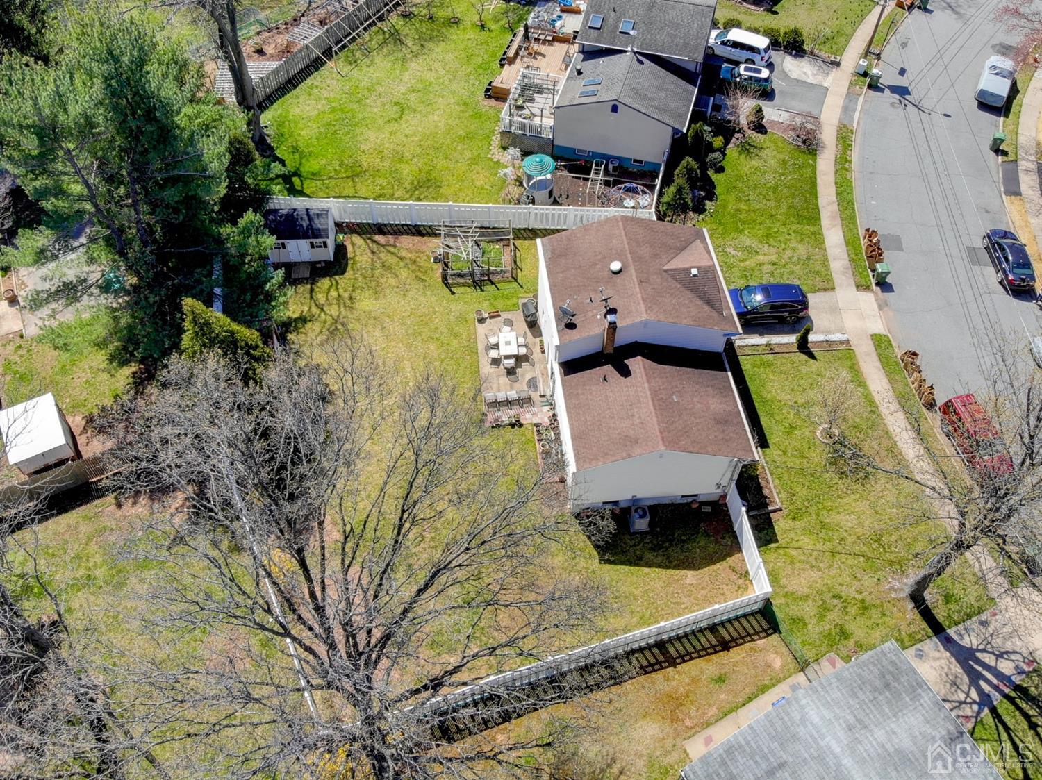 6 Moryan Road Edison, NJ 08817 - Photo 4 of 29 an aerial view of a house with a swimming pool