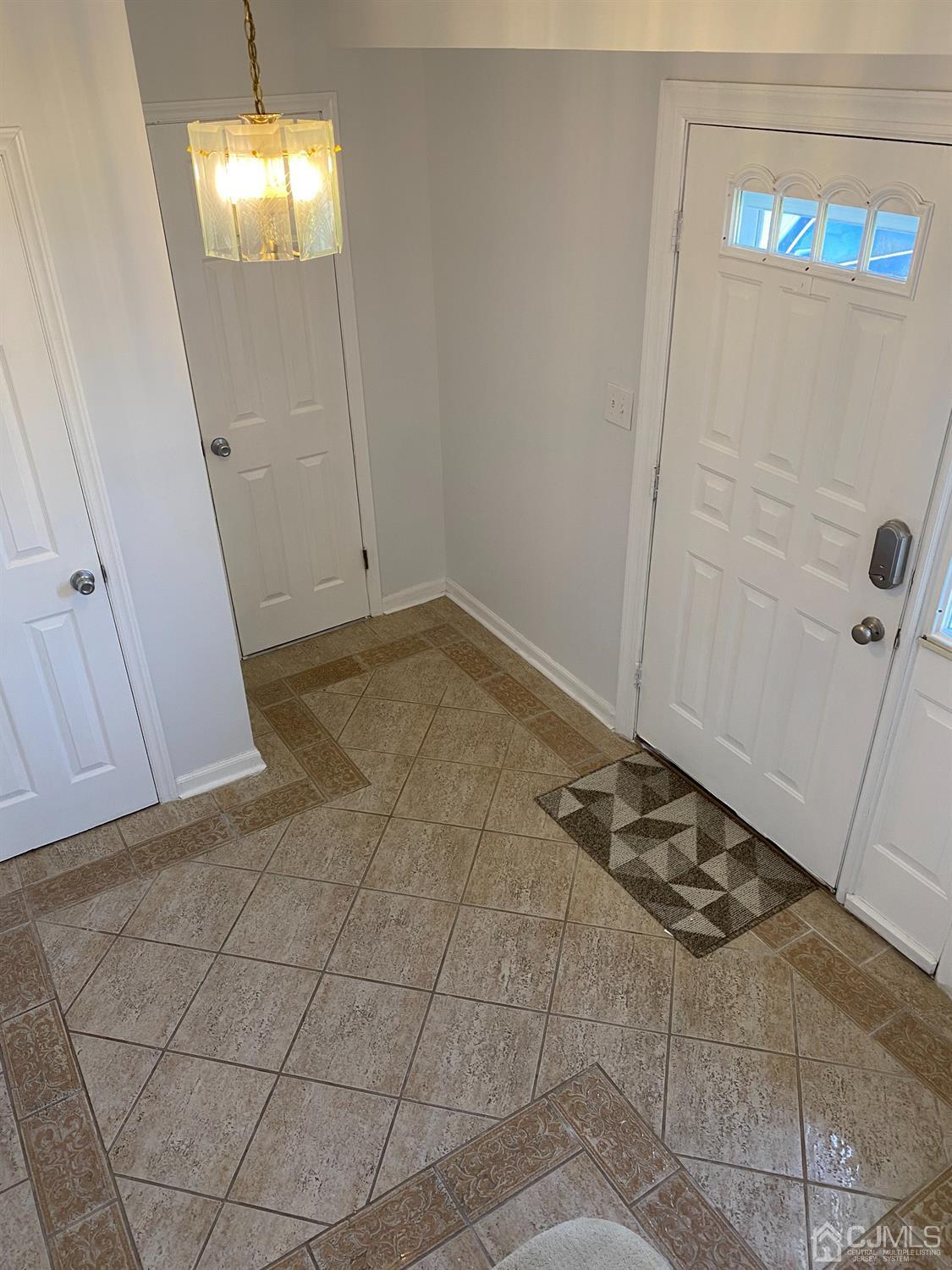 6 Moryan Road Edison, NJ 08817 - Photo 6 of 29 a view of a livingroom with wooden floor