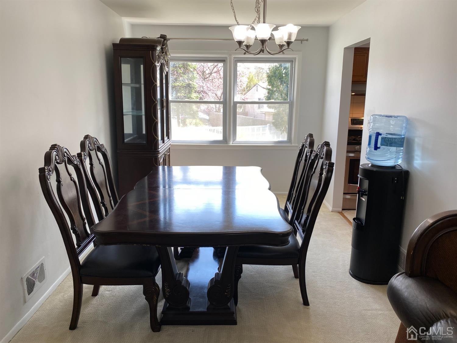 6 Moryan Road Edison, NJ 08817 - Photo 10 of 29 a view of a dining room with furniture window and outside view