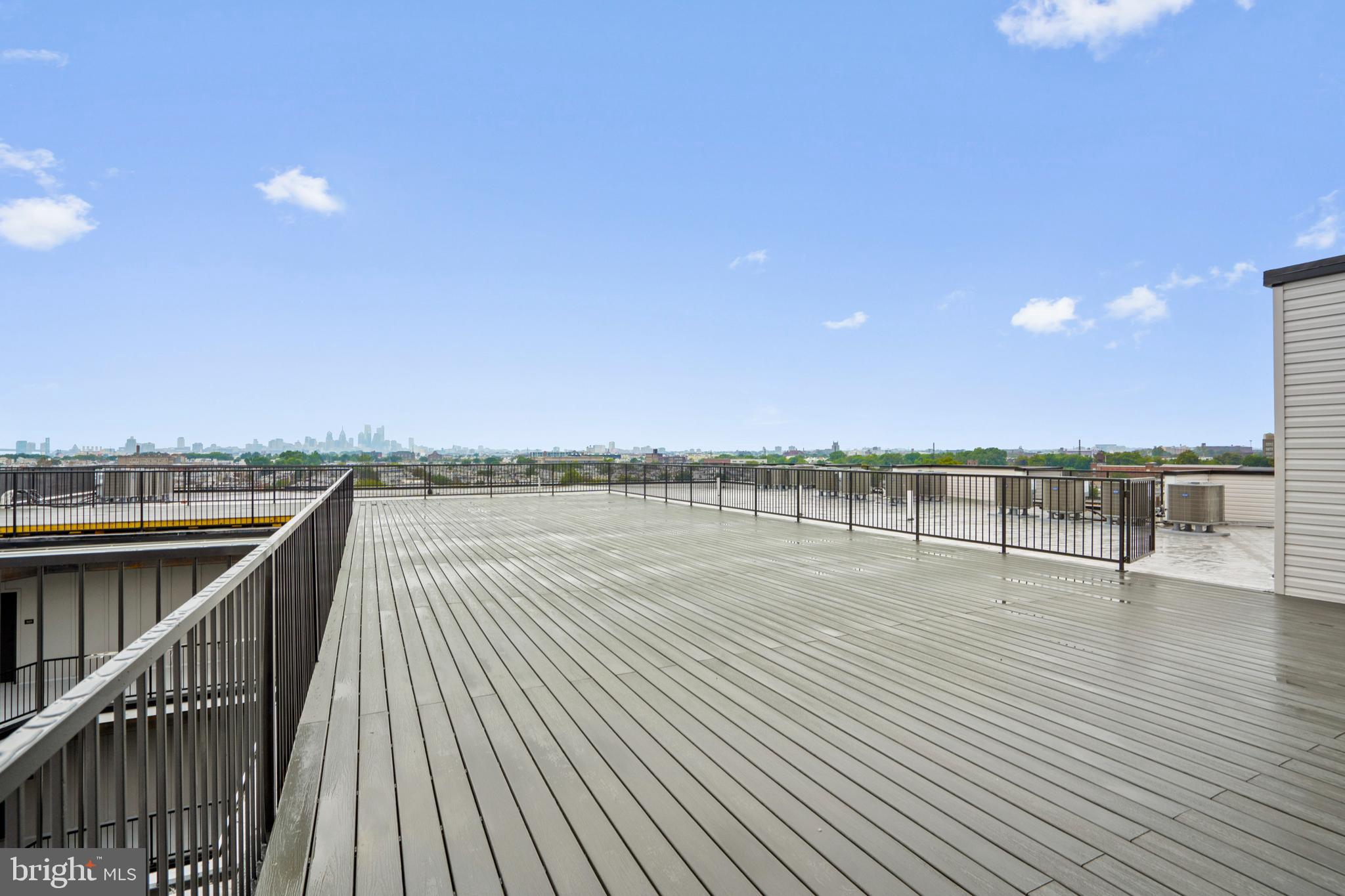 3211 Cedar Street, Unit 405 Philadelphia, PA 19134 - Photo 15 of 18 a view of a balcony with an ocean