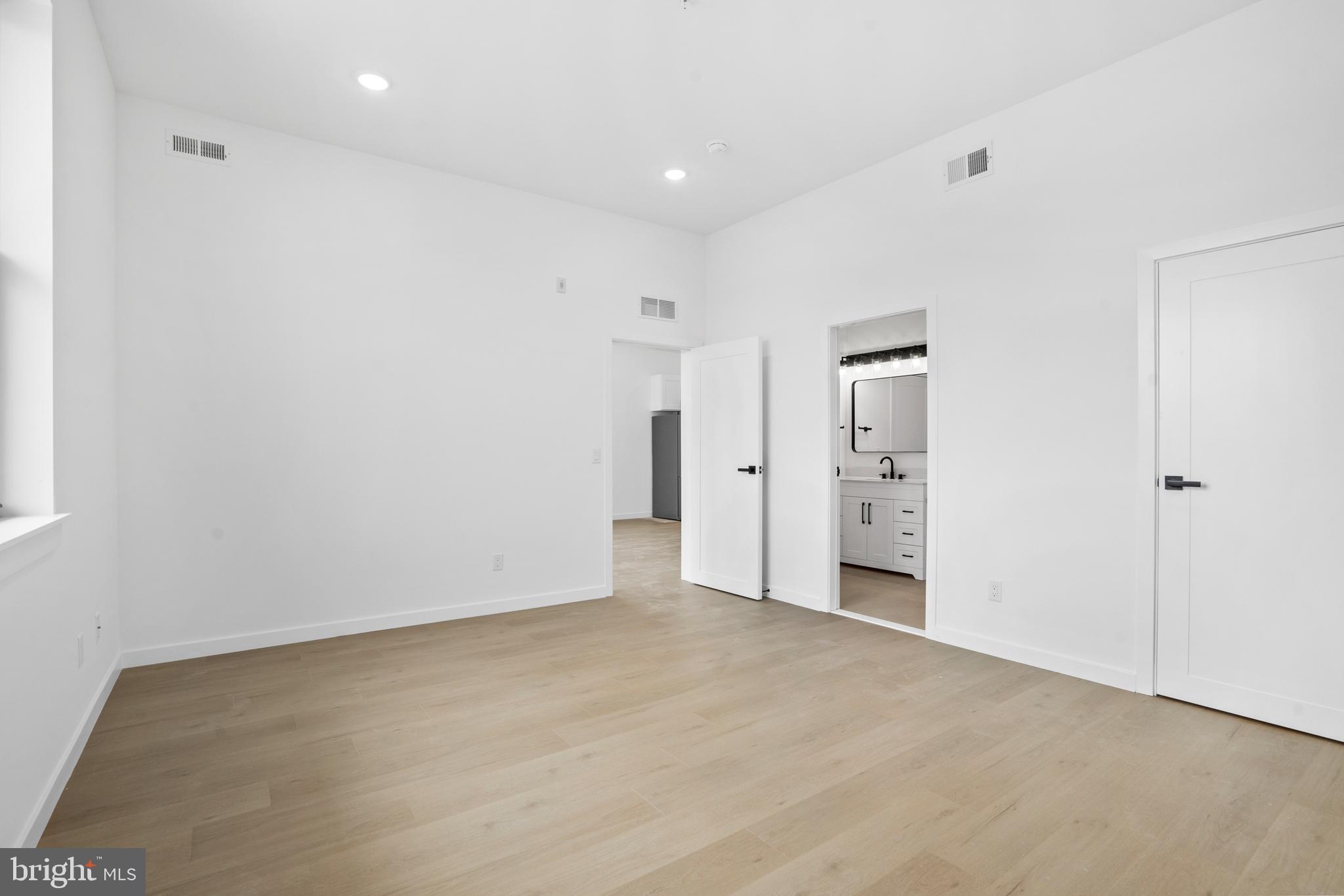 3211 Cedar Street, Unit 405 Philadelphia, PA 19134 - Photo 10 of 18 a view of empty room