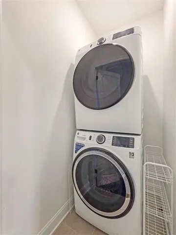 a view of a storage & utility room with wooden floor