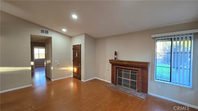 a view of livingroom with furniture and windows