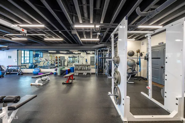 a view of a room with gym equipment