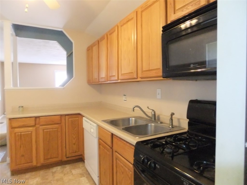 5044 Forest Road Mentor, OH 44060 - Photo 6 of 14 stove, microwave and dishwasher. Seller is offering a home warrants
