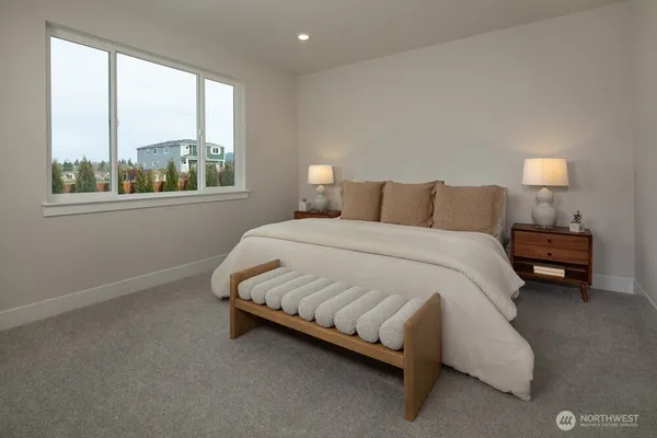 a bathroom with a shower sink and mirror