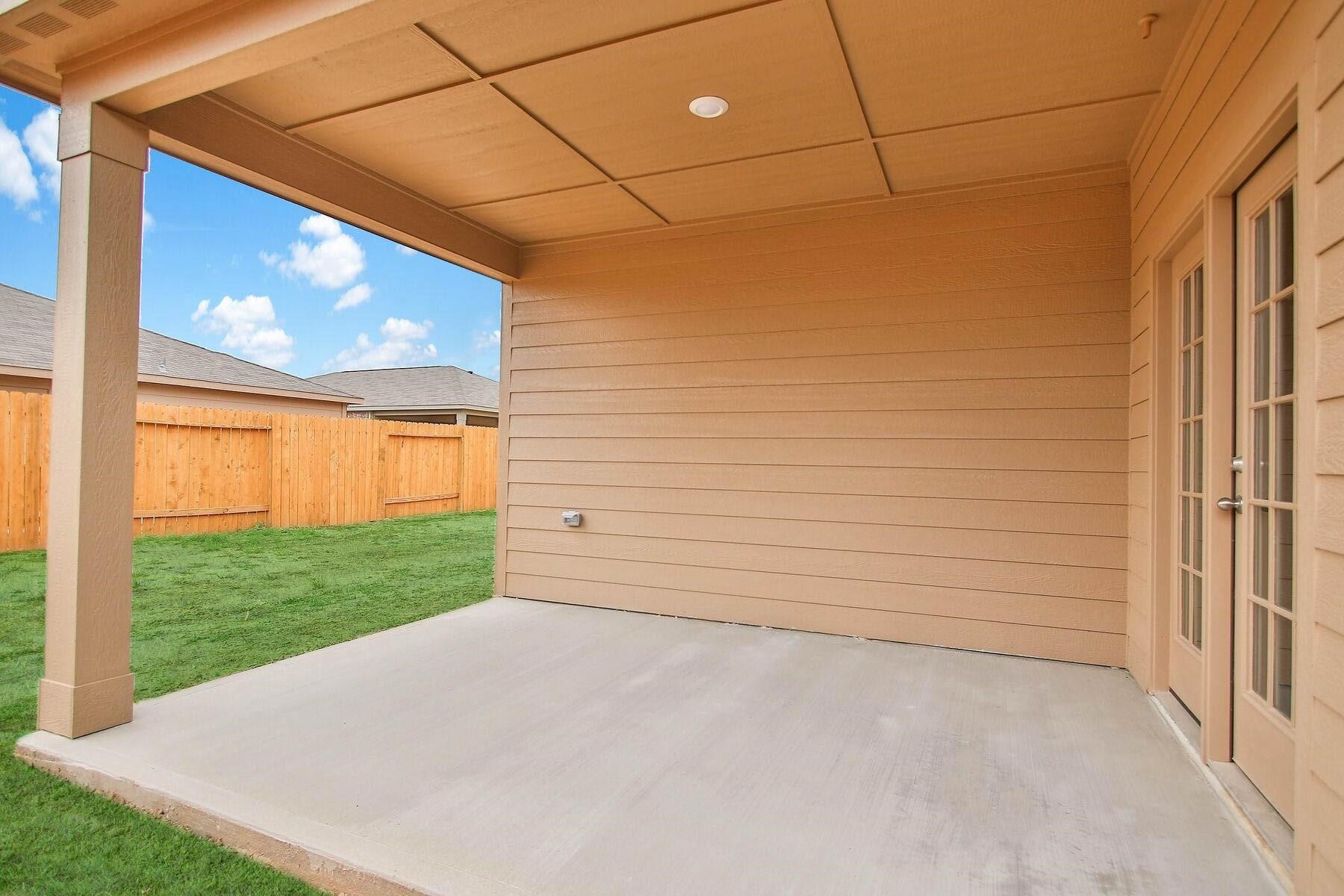 22422 Kennons Way Hockley, TX 77447 - Photo 11 of 11 a view of a big room with an empty space