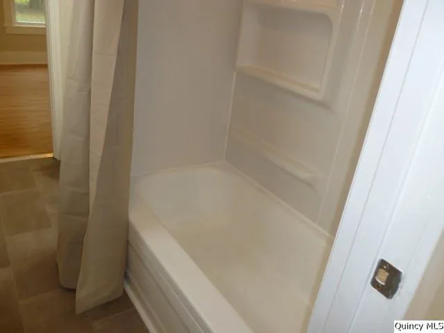 a bathroom with a bathtub