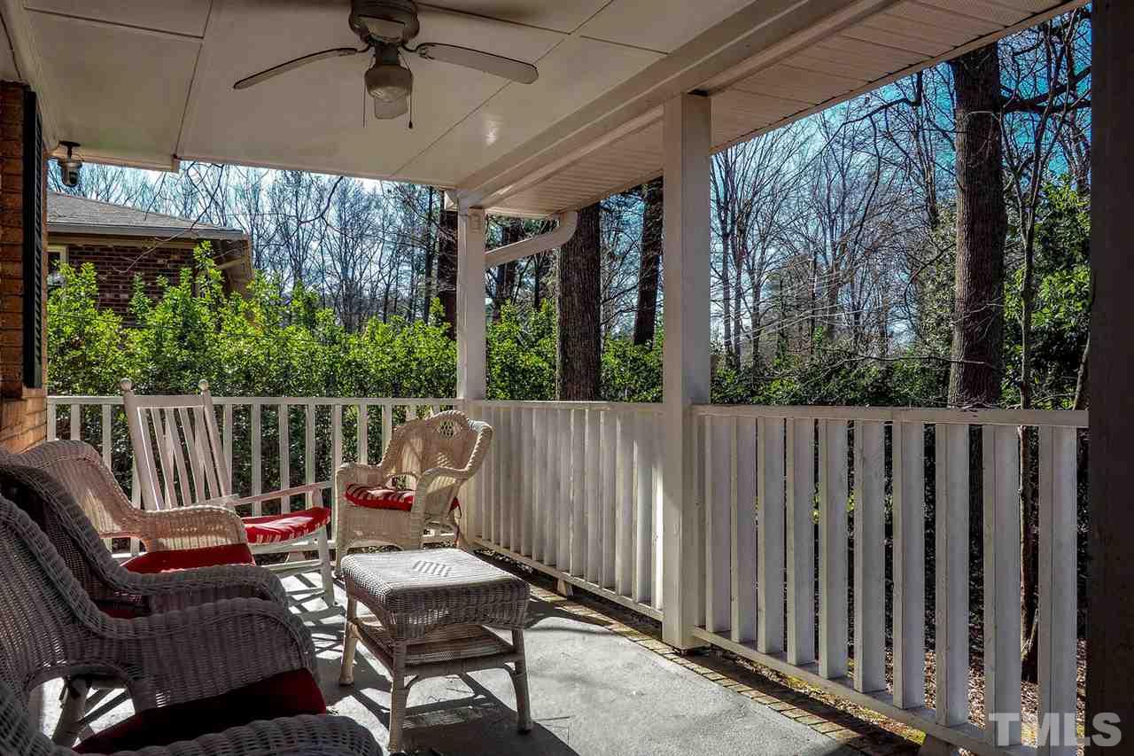 208 Winterlochen Road Raleigh, NC 27603 - Photo 3 of 25 a view of a chairs on the roof deck