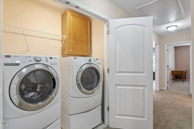 a spacious bathroom with a granite countertop sink and mirror