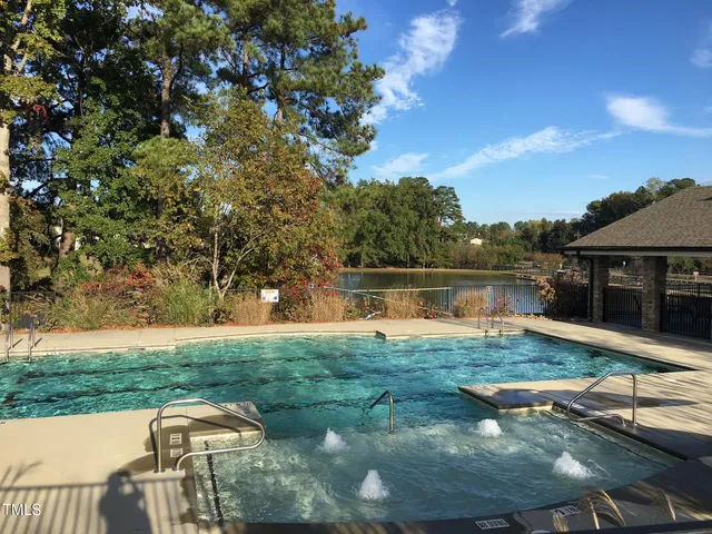 a view of a lake from a balcony