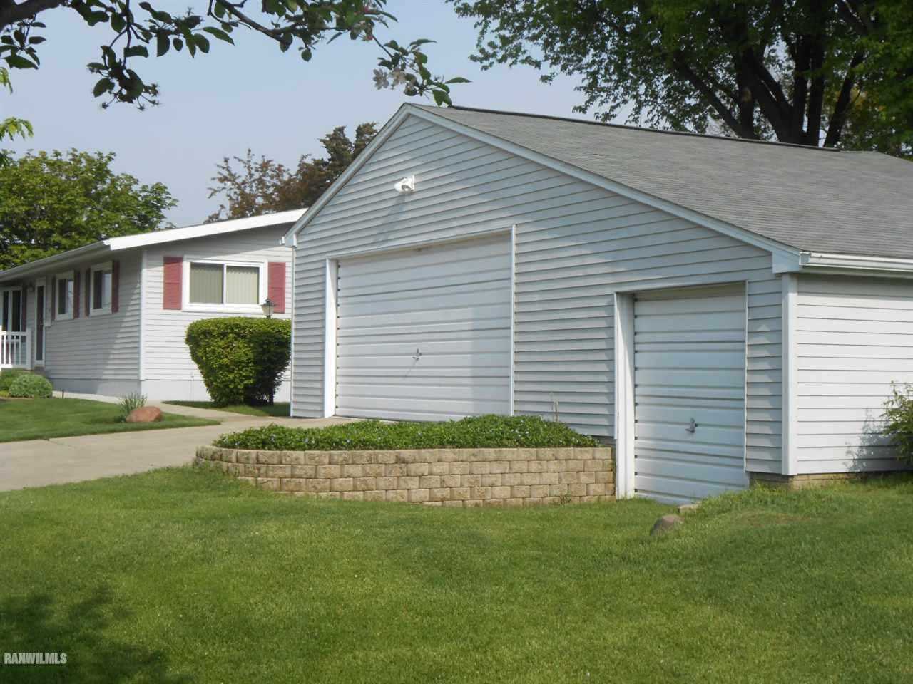 301 East Town Line Road Lena, IL 61048 - Photo 6 of 23 a front view of a house and garden