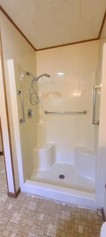 a bathroom with a sink a toilet a mirror and vanity