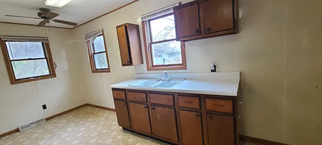 a bedroom with a bed and a mirror