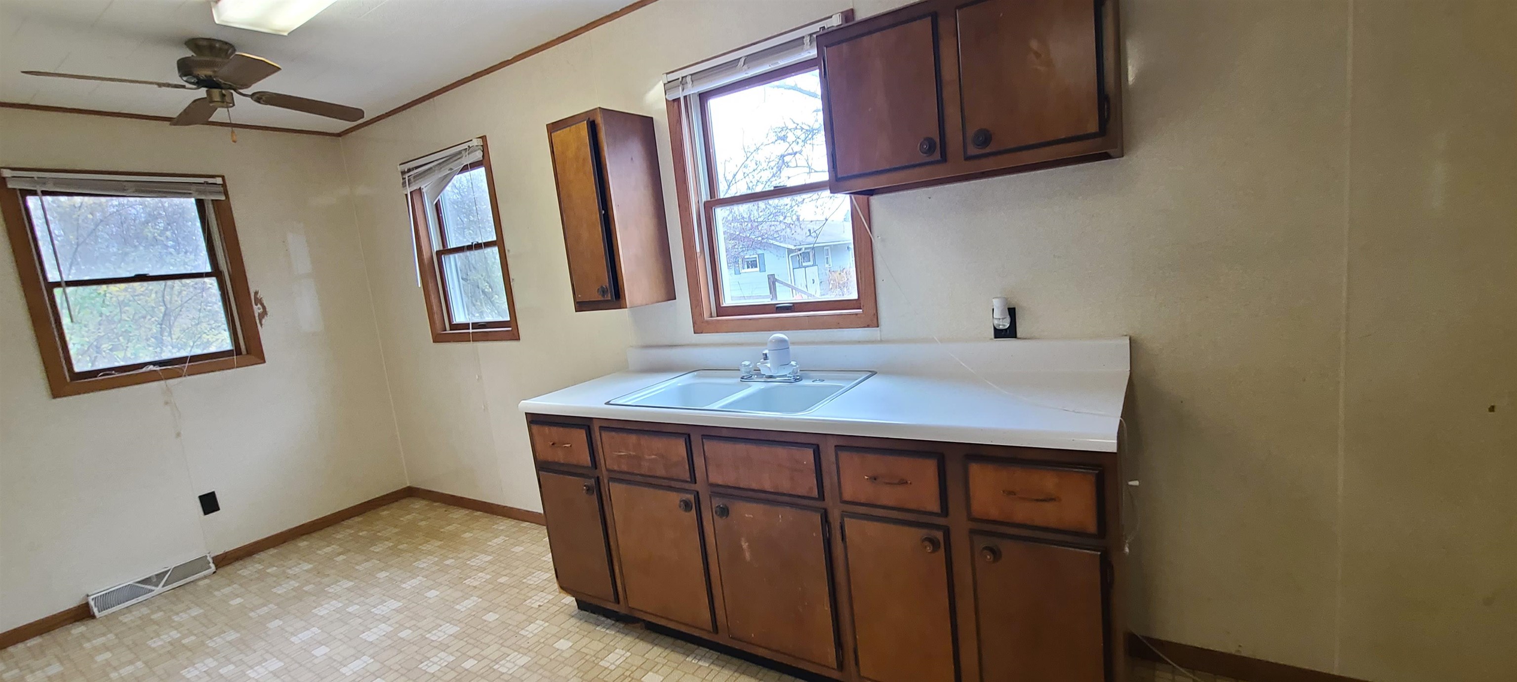 507 Lester Street Mount Carroll, IL 61053 - Photo 20 of 25 a bathroom with a sink and a mirror