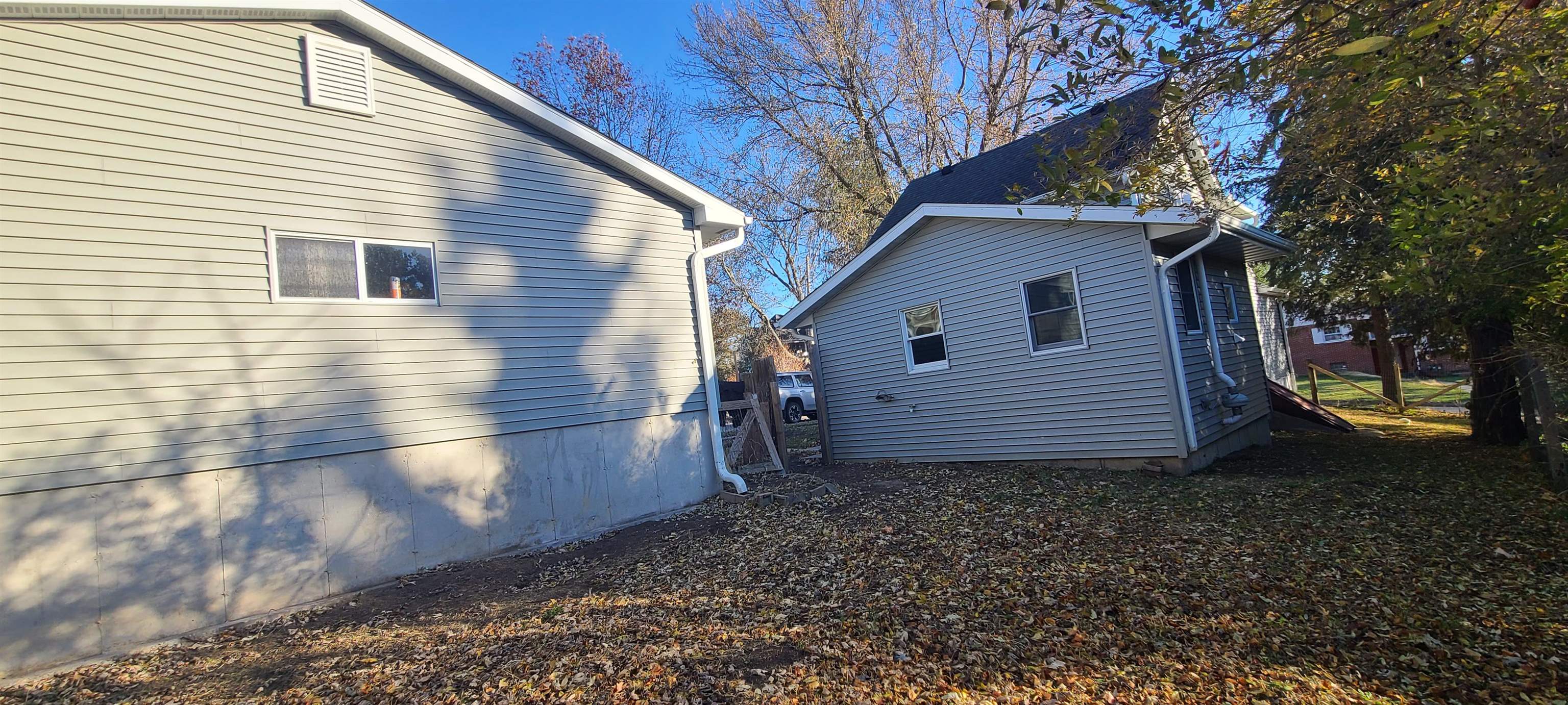 507 Lester Street Mount Carroll, IL 61053 - Photo 2 of 25 a view of a house with a yard