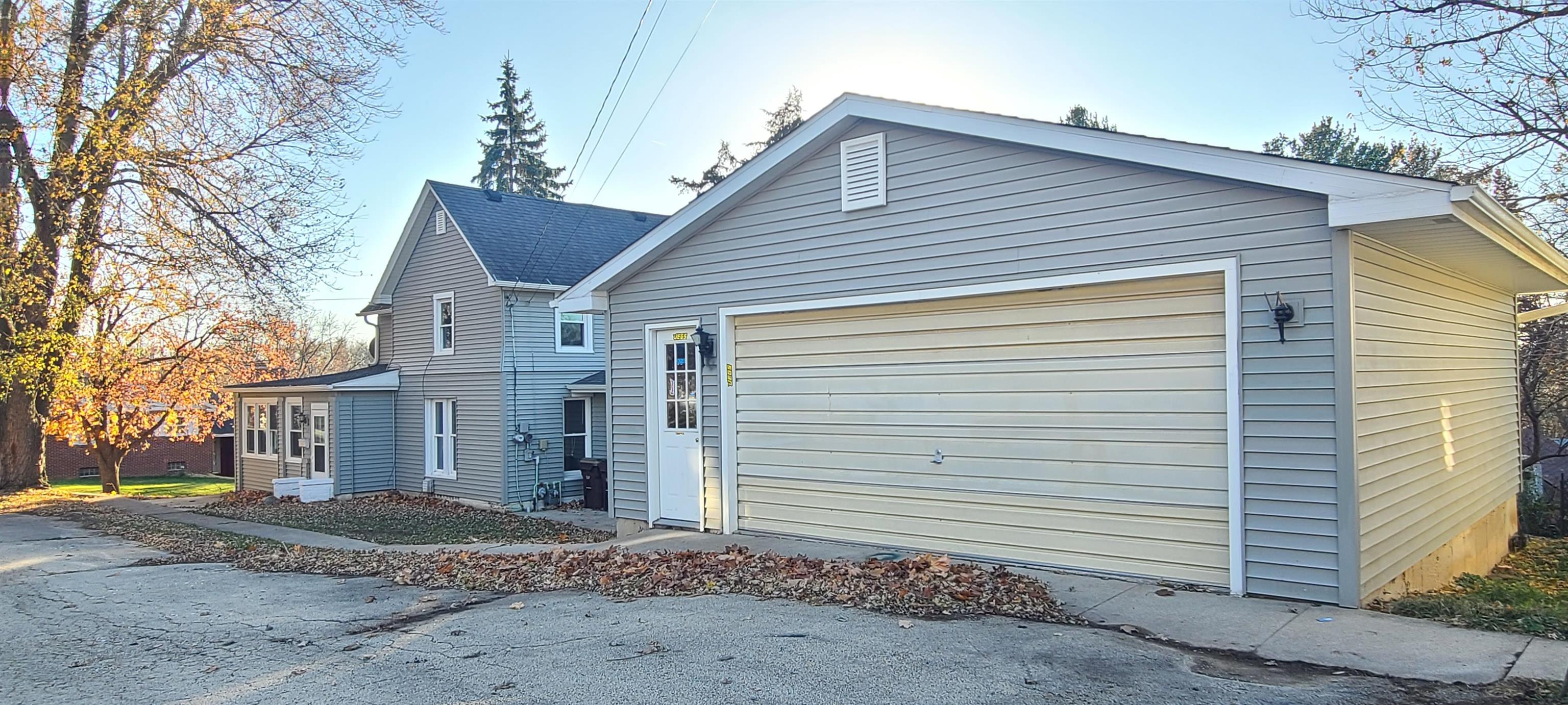 507 Lester Street Mount Carroll, IL 61053 - Photo 8 of 25 a view of a house with a yard