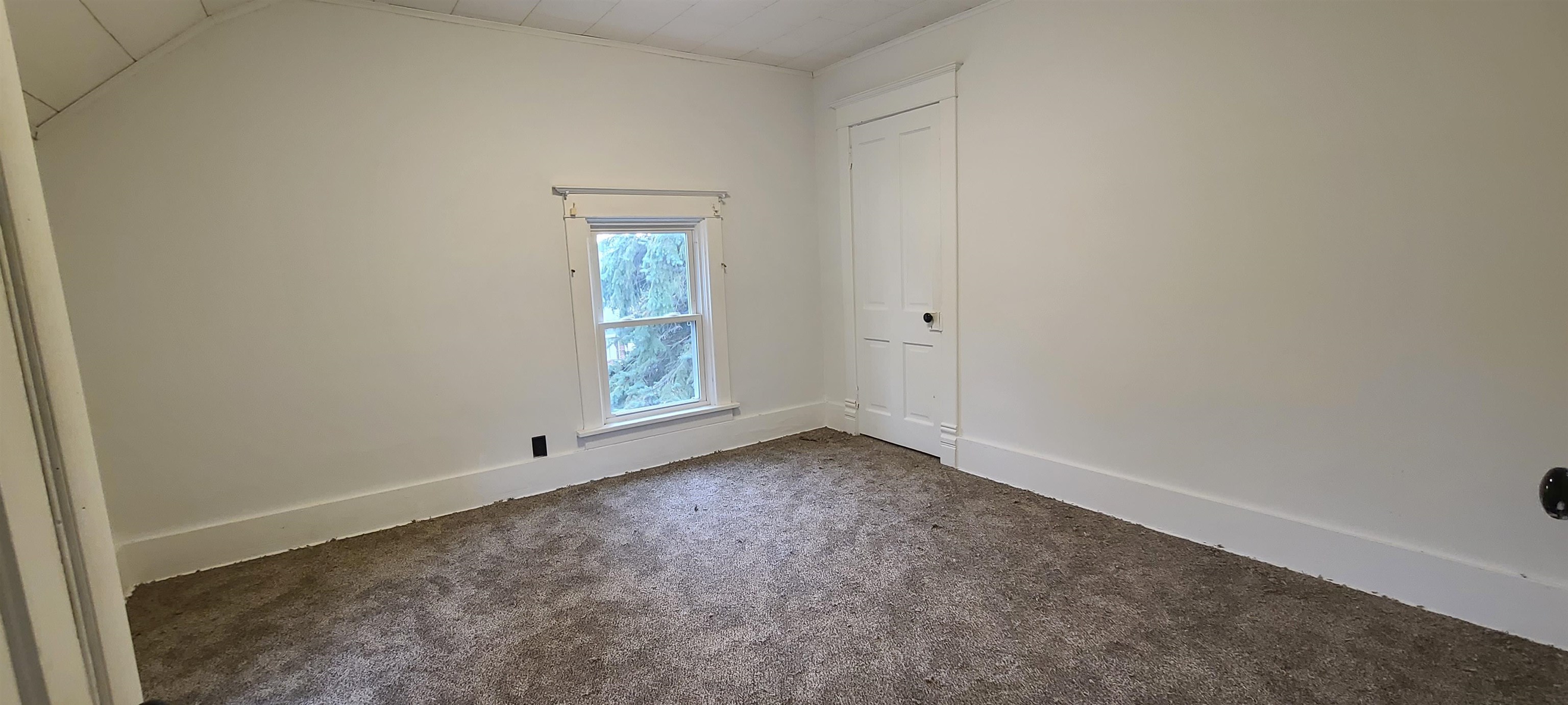 507 Lester Street Mount Carroll, IL 61053 - Photo 10 of 25 an empty room with window