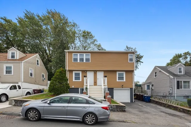 a car parked in front of a house