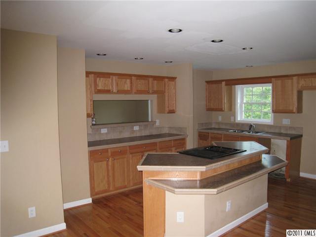 4130 Wycoff Road Sharon, SC 29742 - Photo 2 of 11 a kitchen with a stove and a microwave
