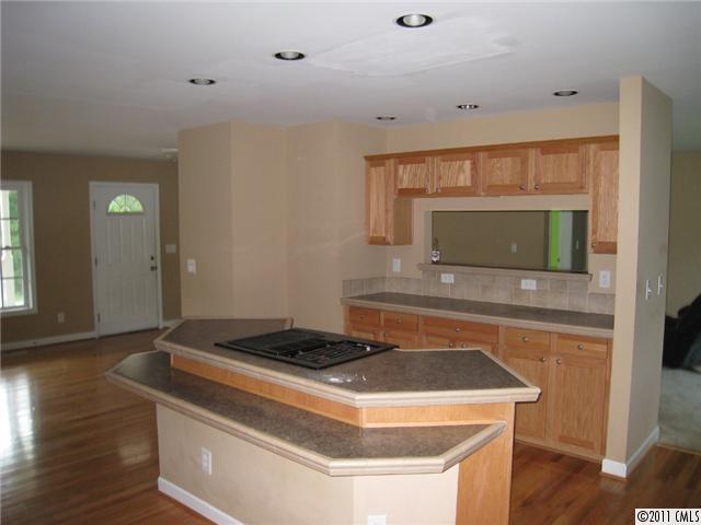 4130 Wycoff Road Sharon, SC 29742 - Photo 3 of 11 a kitchen with a stove and a microwave
