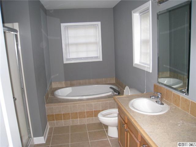 4130 Wycoff Road Sharon, SC 29742 - Photo 5 of 11 a bathroom with a sink toilet and shower