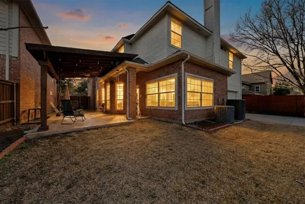 a view of a house with a snow in a yard