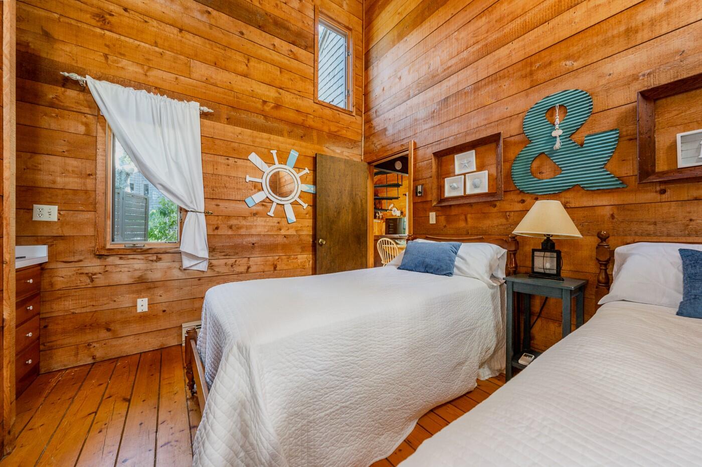 1780 Route 6, Unit D3 Wellfleet, MA 02667 - Photo 14 of 25 a bed sitting in front of a building