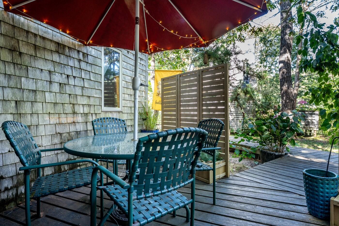 1780 Route 6, Unit D3 Wellfleet, MA 02667 - Photo 10 of 25 a view of a chairs and table in the balcony