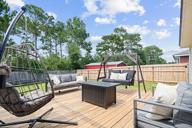 a view of a roof deck with couches