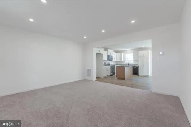 a view of a kitchen with a sink