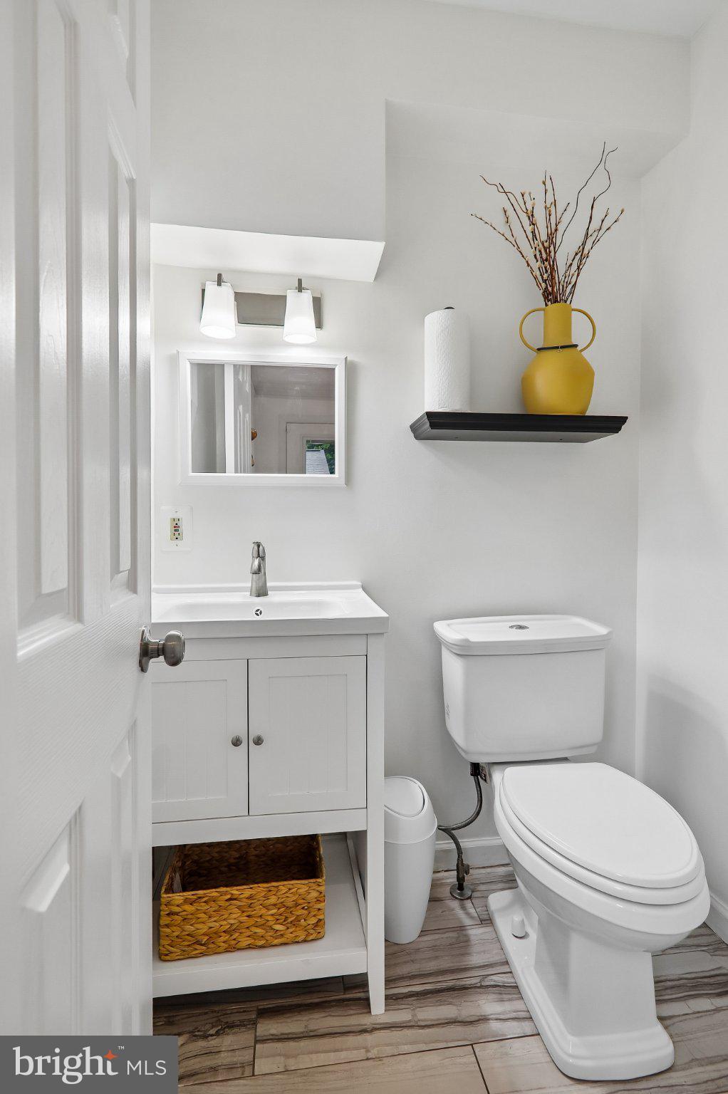3103 Walnut Street Northeast Washington, DC 20018 - Photo 17 of 40 Chic and modern bathroom retreat.