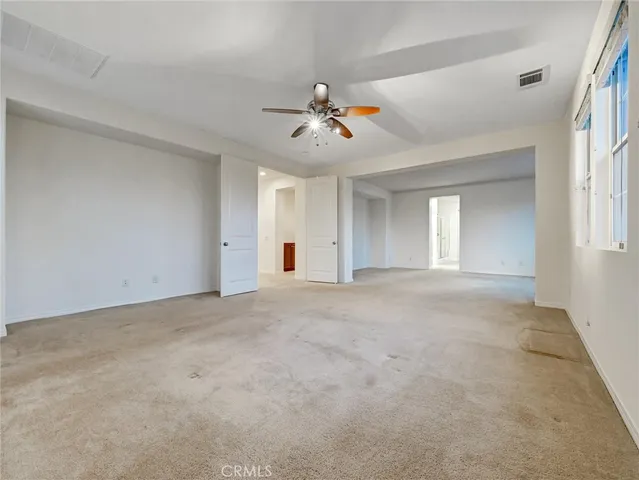 a bathroom with a sink a mirror and a light fixture