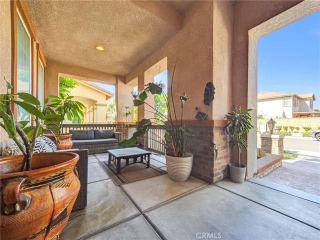 front view of a brick house with a garage