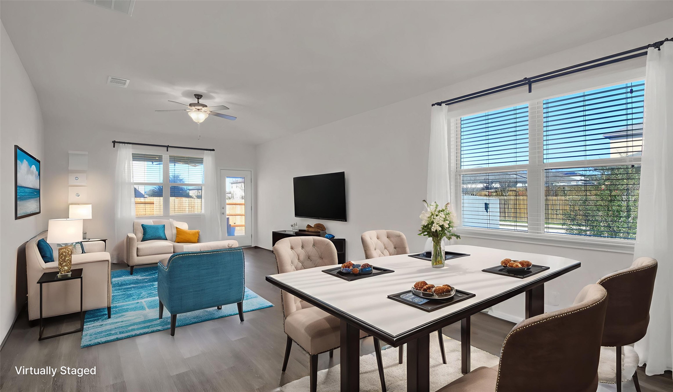 19032 Quebrada Drive Pflugerville, TX 78660 - Photo 1 of 29 Open concept dining area featuring wood finished floors.