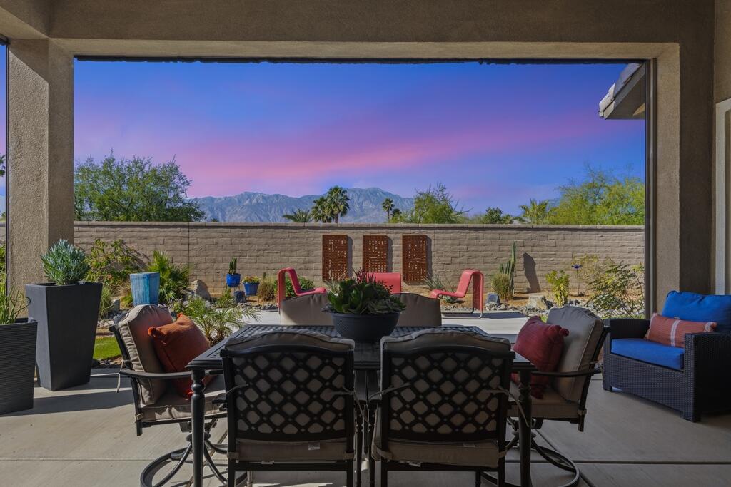 77 Barolo Rancho Mirage, CA 92270 - Photo 1 of 61 a view of a balcony with lake view and a potted plant