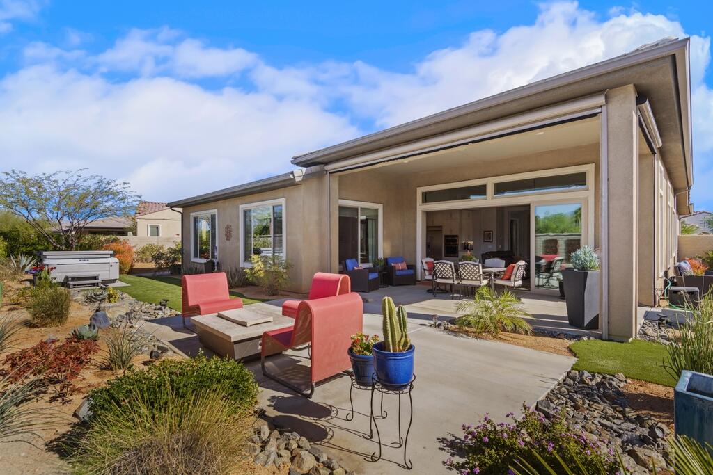 77 Barolo Rancho Mirage, CA 92270 - Photo 15 of 61 a view of a house with backyard porch and sitting area