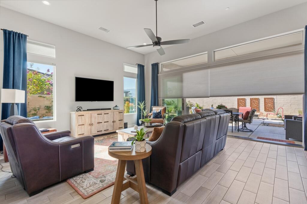 77 Barolo Rancho Mirage, CA 92270 - Photo 22 of 61 a living room with furniture and a flat screen tv