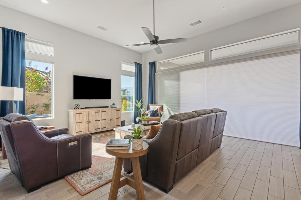 77 Barolo Rancho Mirage, CA 92270 - Photo 23 of 61 a living room with furniture and a flat screen tv