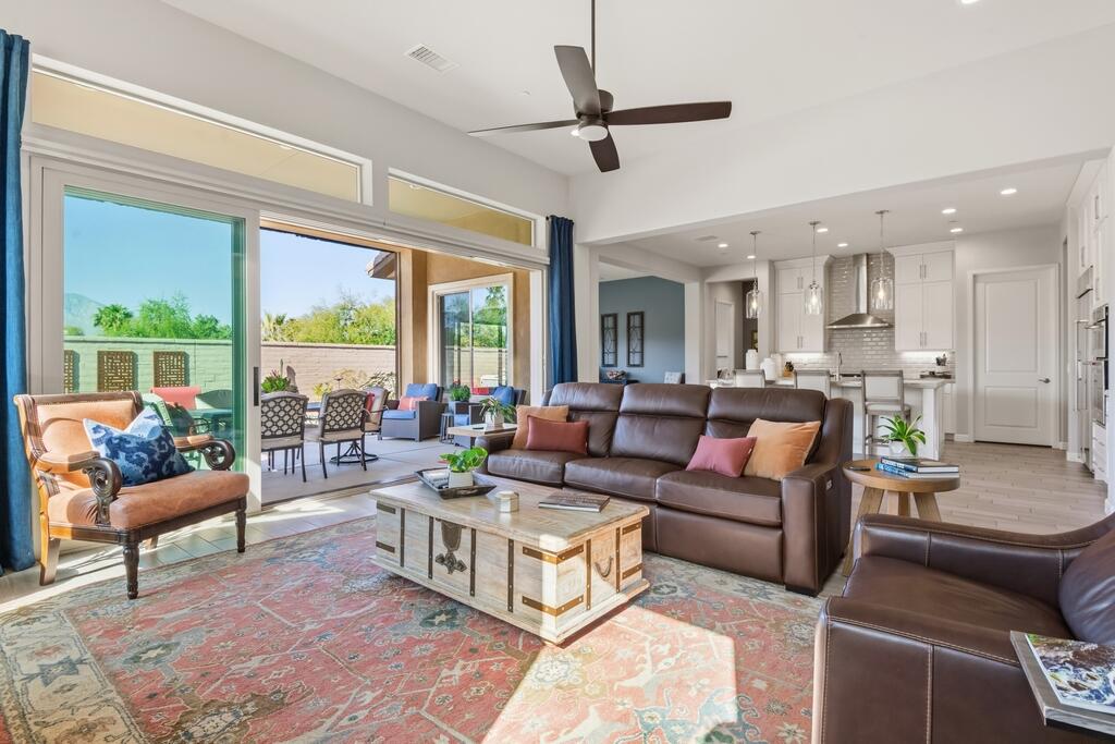 77 Barolo Rancho Mirage, CA 92270 - Photo 24 of 61 a living room with furniture and a large window
