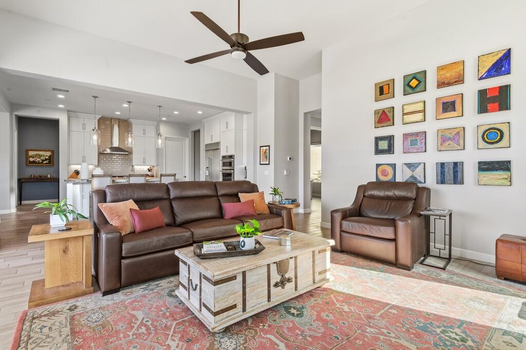 77 Barolo Rancho Mirage, CA 92270 - Photo 25 of 61 a living room with furniture and a flat screen tv
