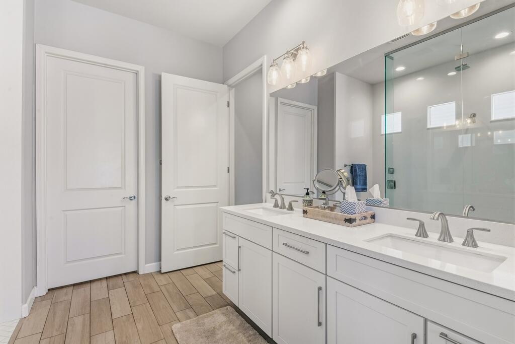77 Barolo Rancho Mirage, CA 92270 - Photo 35 of 61 a bathroom with a double vanity sink mirror and