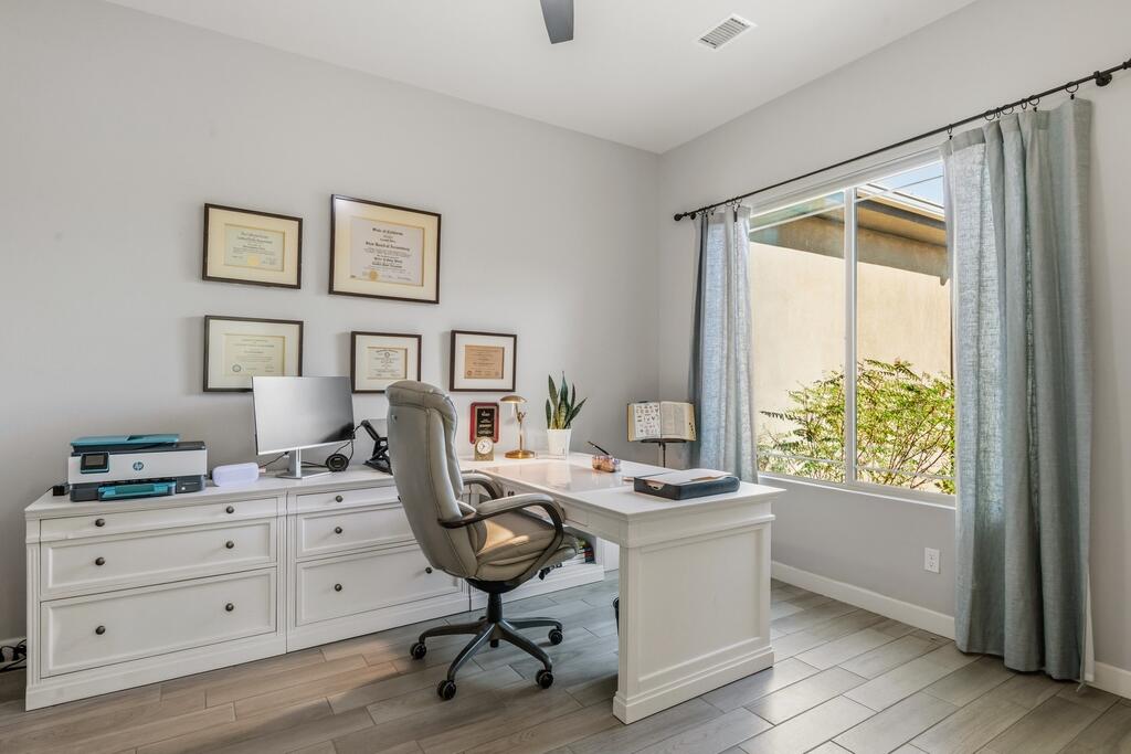 77 Barolo Rancho Mirage, CA 92270 - Photo 41 of 61 a view of a workspace with furniture and a window
